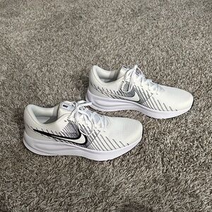 Nike White and Black Run Defy Sneakers